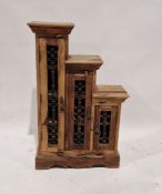 Modern table-top storage cupboard comprised three drawers of graduating form, each with iron