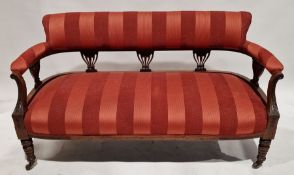 Victorian mahogany two-seat sofa with upholstered seat, back and arms on front turned legs with