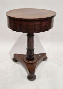 Regency rosewood lift-up teapoy, on carved column support and tripod base, 55cm diameter