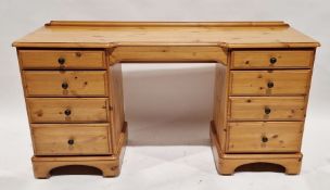 Modern pine dressing table by Ducal, each pedestal having four short drawers, with separate dressing