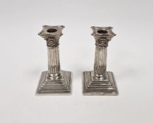 Pair of Edwardian silver dwarf table candlesticks, each with removable sconce, stop fluted column
