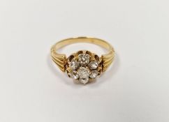 Gold coloured metal and diamond cluster ring having central stone surrounded by six further old