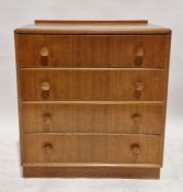 Mid-century blonde oak chest of drawers by Meredew having four long drawers with turned wooden