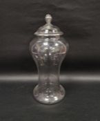 Large 19th century Continental blown baluster apothecary jar and cover, with knop finial, 41cm high