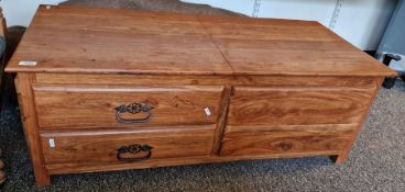 Modern stained hardwood storage unit, with two short drawers to one side opening lid to the other,