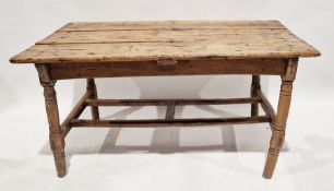Antique pine dining table of rectangular form, raised on turned legs, 70cm high x 136cm wide x
