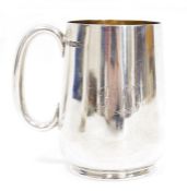 Victorian tapering cylindrical silver mug, engraved with the conjoined initials HM/HL, the