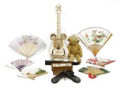 1950's Skiffle Junior hard vinyl ukulele, an old gold plush teddy bear (worn), box of old