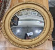 20th century gilt framed convex wall mirror, of circular form, 36cm diameter