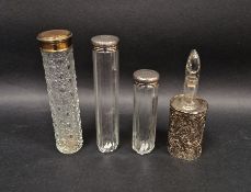 Victorian silver-mounted cut-glass perfume bottle and stopper and two silver-topped cut-glass jars