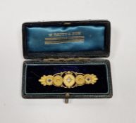 Victorian 15ct gold, diamond and sapphire bar brooch, the central circular medallion set with old