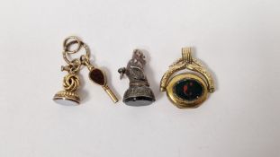 Victorian silver and bloodstone set seal with dog's head handle, stone set watch key and two other
