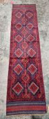 Meshwani blue ground runner with two rows of six lozenge medallions on a geometric field single
