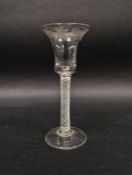 Engraved opaque twist wine-glass, circa 1760, the flared bowl engraved with fruiting vine, on an