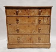Late Victorian pine chest of drawers with two short drawers above three long graduating drawers,