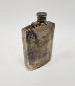 George V silver spirit flask, rectangular, slightly curved and engine turned with hinged top,