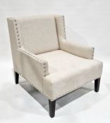 Modern armchair with chrome button decoration to the arms and back, 88cm high