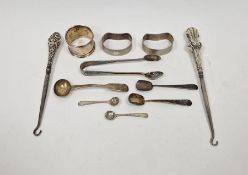 Pair silver napkin rings, engine-turned, two silver-handled button hooks, another napkin ring, sugar