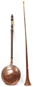 Long copper and brass hunting horn, trumpet-shaped, 123cm high and a copper warming pan with