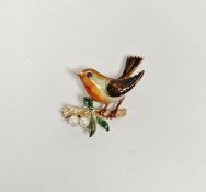 9ct gold enamel seed pearl and red stone robin brooch, the robin on a branch having eye inset with
