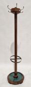 Early 20th century oak coat and umbrella stick stand of cylindrical form, 185cm high together with