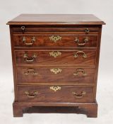 Reproduction mahogany bachelor's chest of four long drawers with brass drop handles, on bracket
