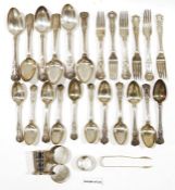 Assortment of silver plated flatware to include table forks, spoons, sugar tongs, butter knives, etc