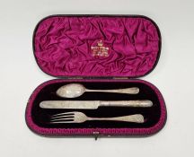 Victorian cased engraved silver christening set, comprising: a knife, fork and spoon, engraved