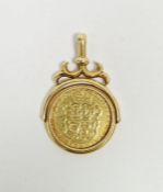 George III gold guinea 1786 in Victorian 18ct gold swivel pendant with scroll surmount hallmarked
