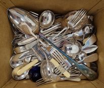 Assorted silver plate flatware to include a basting spoon, cake forks, soup spoons etc (1 box)