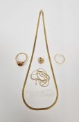 18ct gold wedding band, worn, 9ct gold and garnet cluster ring, two 9ct gold fine chains, and gold