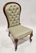Victorian mahogany button-back nursing chair with upholstered seat and back on original metal