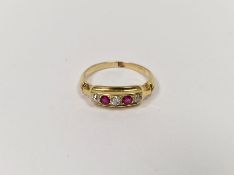 Antique gold-coloured metal ring, a ruby-coloured stone and diamond ring set three diamonds and
