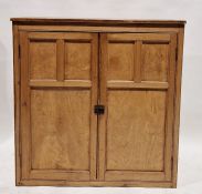 Early 20th century pine kitchen cupboard with double panelled doors enclosing four shelves, 111cm
