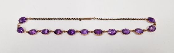 Late Victorian/|early 20th century 9ct gold and amethyst necklace set thirteen oval claw set