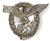 German cast metal badge in the form of a Second World War luftwaffe pilots badge, unmarked
