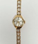Lady's 9ct gold Corvette manual wind wristwatch, the silvered dial with raised gilt baton hour