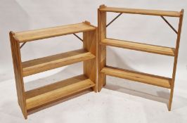 Two modern pine bookshelves, the largest measuring 103cm high x 82cm wide x 20cm deep approx.