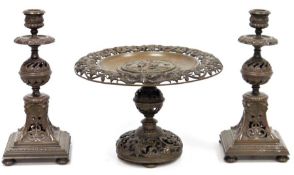 Late Victorian bronze garniture of three pieces, viz:- tazza with pierced everted rim and the top