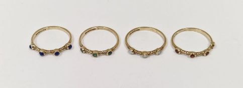 Set of four 9ct gold half-hoop rings, each set with miniature cabochon four sapphires, four garnets,