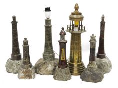 Extensive collection of Cornish Serpentine model lighthouses in various materials, to include