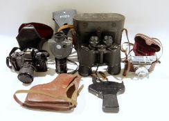 Cased Nikon F301 semi-automatic camera with a Sigma 1:3.5-4.5 lens, a Pysis viewer with Fuji lens