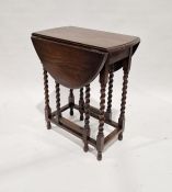 Oak gateleg table on spiral turned supports, the oval top, 73cm high x 88cm x 62cm