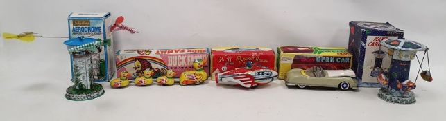 Five boxed tinplate toys to include Schylling Rocket Carousel, Schylling Aerodrome Airport control