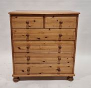 Modern pine chest of two short and four long drawers, on bun-shaped feet, 91cm high x 83cm wide x