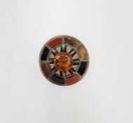 Scottish silver-coloured metal and hardstone brooch with central orange cut stone, possibly topaz