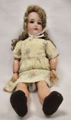 Large Armand Marseille bisque head doll, early 20th century, impressed factory marks and AM390, with