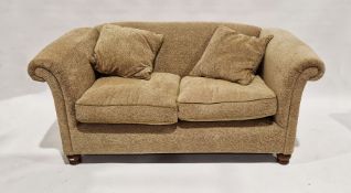 Pair of two-seat sofas by John Lewis, in ochre cut velvet on turned supports with scatter cushions