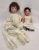 Armand Marseille bisque headed doll, no.327 A10M, in cream babygown, 46cm high and an Armand