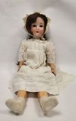 Large Schoenau & Hoffmeister early 20th century bisque head doll, impressed SPBH star marks, no.